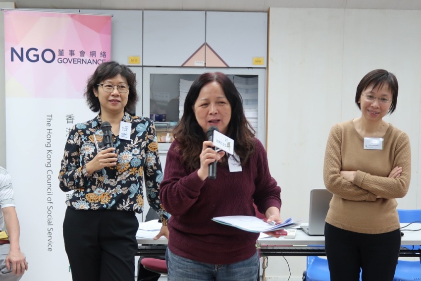 A director (middle) shared her group’s learning after the discussion.